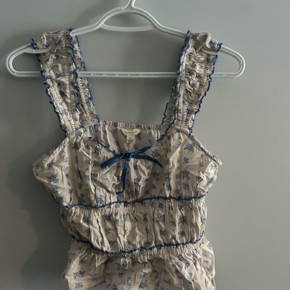 Floral Ruffled Sleeveless Top with Blue Accents